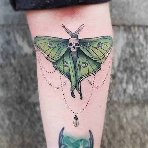 black luna moth tattoo|Luna Moth Tattoo Meaning, Designs, Placement, Pros。